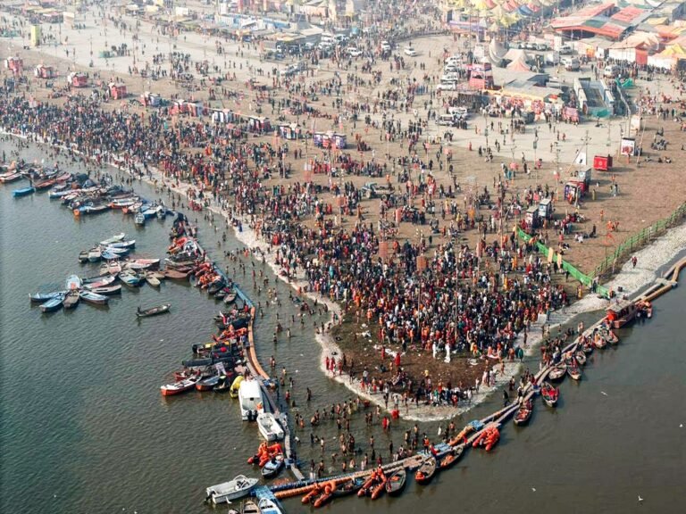 Devotees gather at the ongoing Magh Mela at the Triveni Sangam